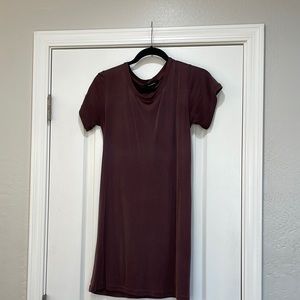 Mini dress. Worn for a few occasions. Some pulls in the underarms (see photos).